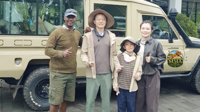 Mwisho wa Mwezi Adventures guide with family on a Tanzania safari