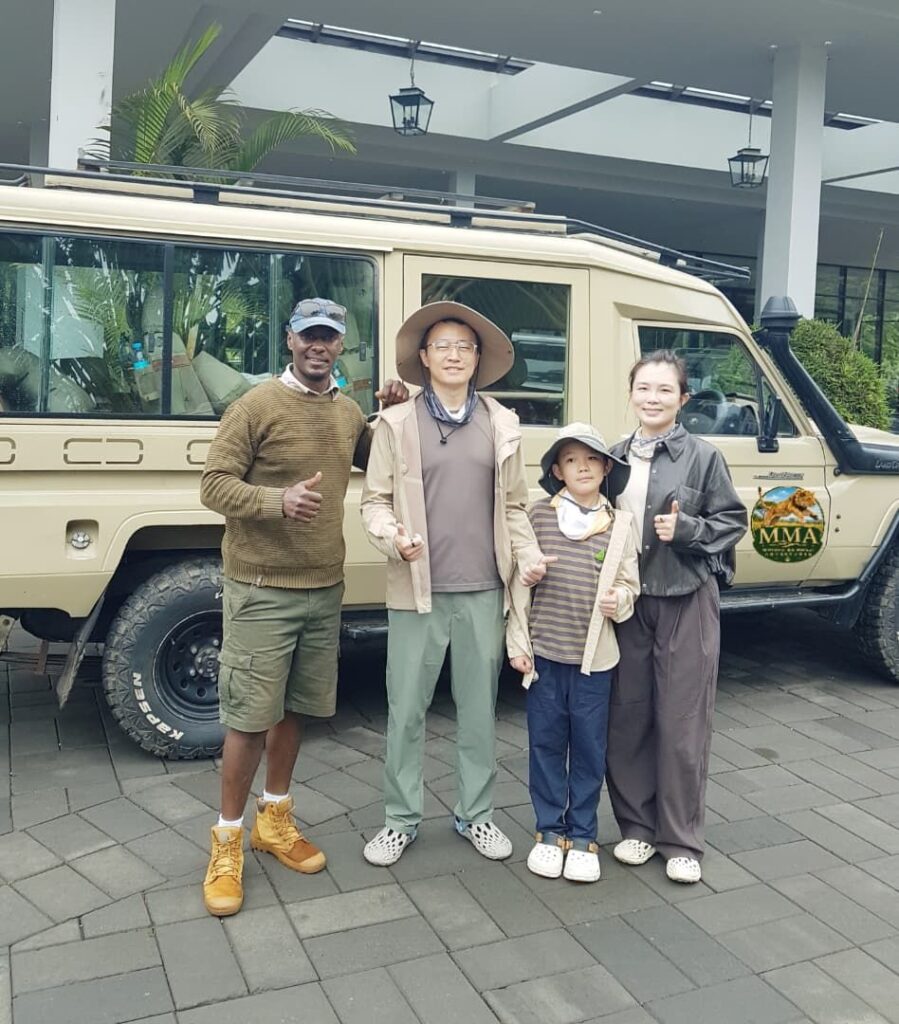 Mwisho wa Mwezi Adventures guide with family on a Tanzania safari